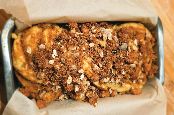 Gently settle the dough in a pan.